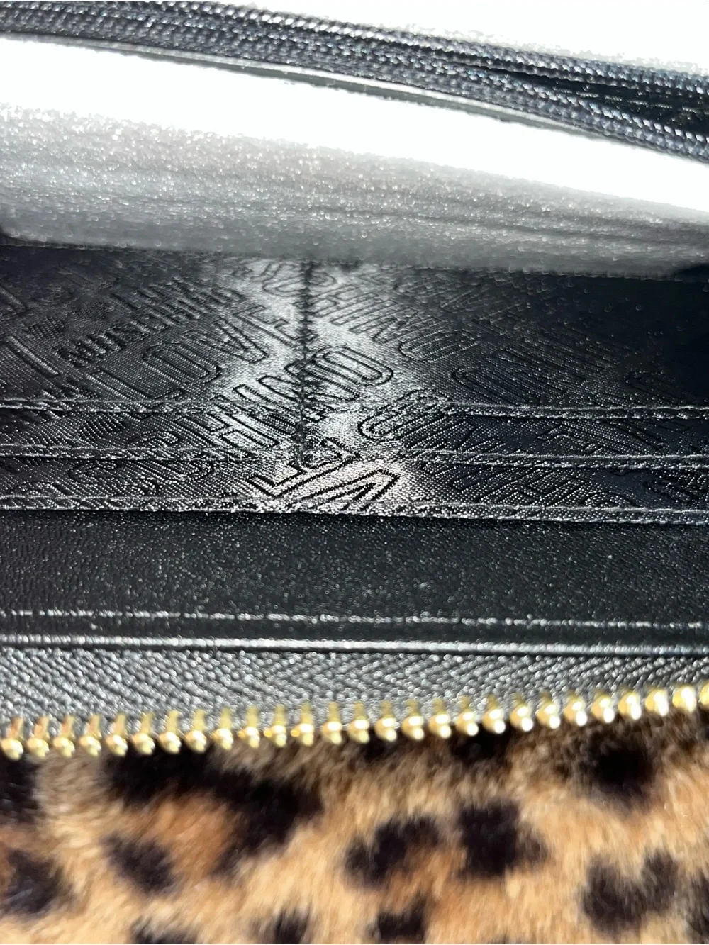 Love Moschino Black Quilted Studded Zip Wallet with Gold Heart Details